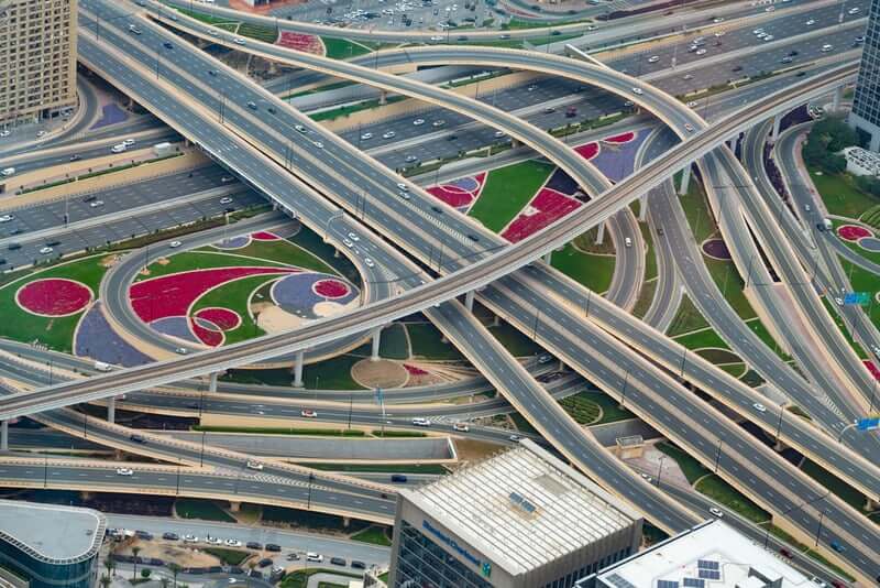 A set of busy, winding motorway roads looping and crossing each other.